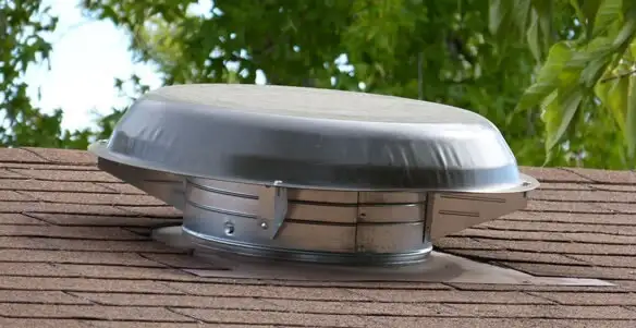 attic fan installation services with low-profile roof ventilation unit in Grand Rapids, MI