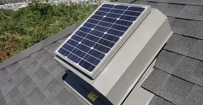 attic fan installation services with energy-efficient roof-mounted ventilation system in Grand Rapids, MI