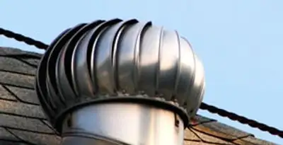 attic fan installation services with professionally installed roof ventilation unit in Grand Rapids, MI