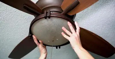 Ceiling fan repair and reinstallation on ceiling mount in Grand Rapids, MI