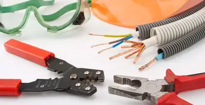 Electrical wiring repair with professional tools and safety equipment in Grandville, MI