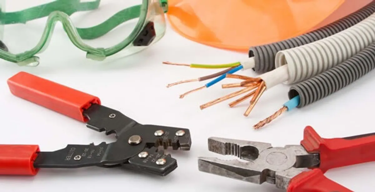 Electrical wiring repair with professional tools and safety equipment in Jenison, MI