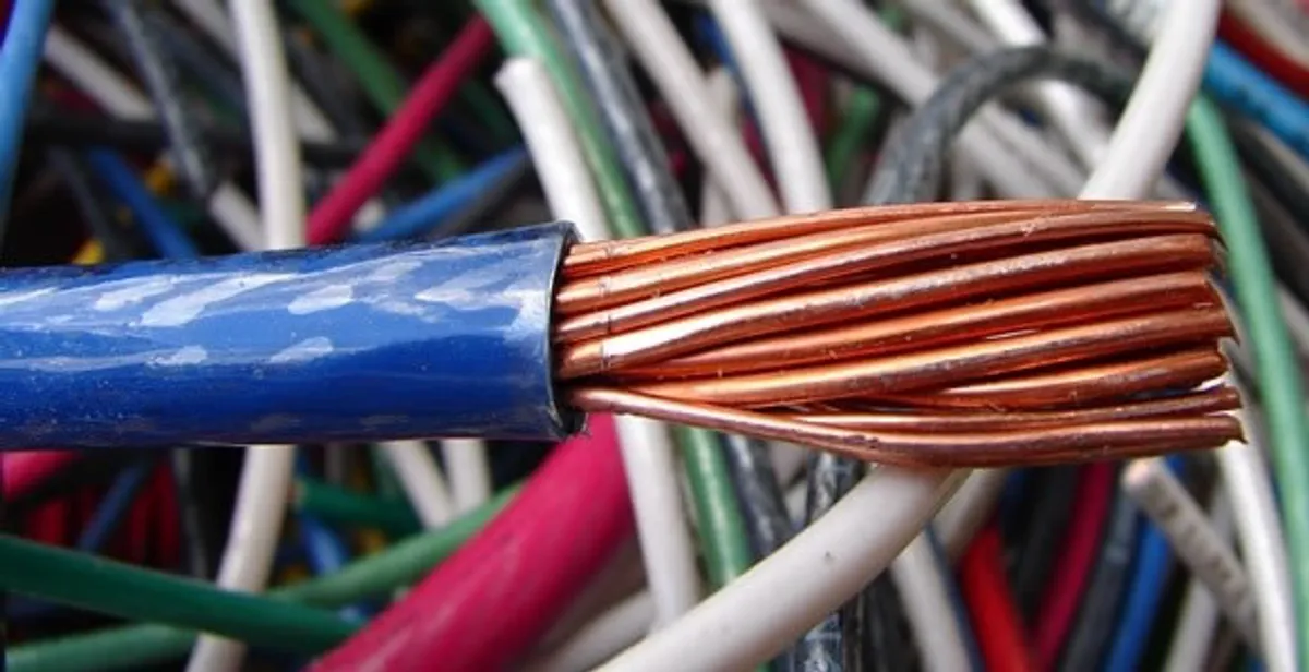 electrical wiring services showing exposed copper conductors and cable preparation in Grand Rapids, MI