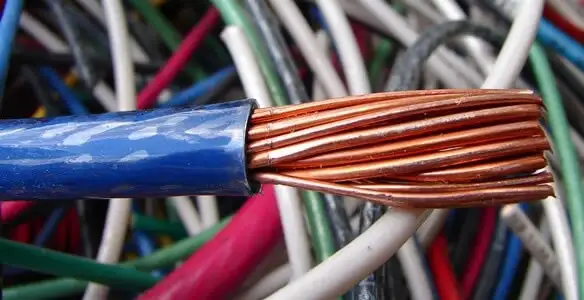 electrical wiring services showing exposed copper conductors and cable preparation in Grand Rapids, MI