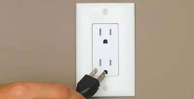 gfc outlets service demonstrating proper testing and use of ground fault circuit interrupter outlet in Grand Rapids, MI