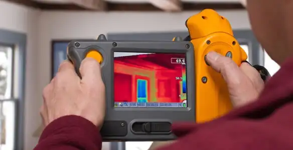 home energy audit service capturing thermal readings to analyze insulation and electrical efficiency in Grand Rapids, MI