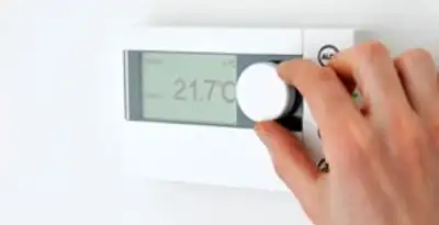 Thermostat installation service with professional adjusting temperature control in Grand Rapids, MI